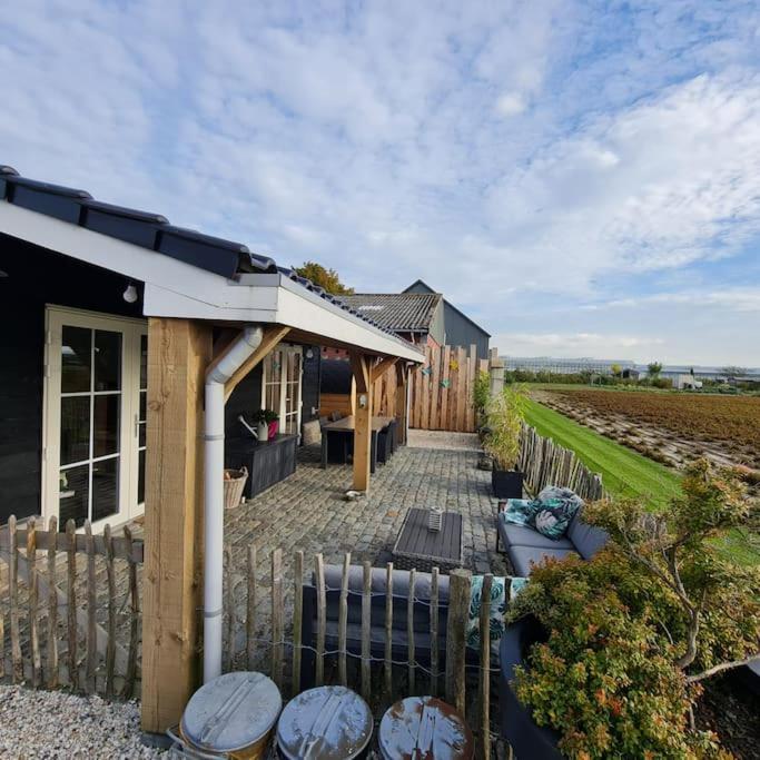 Wellness Chalet Met Jacuzzi, Sauna, Omheinde Tuin, Sint Annaland Esterno foto